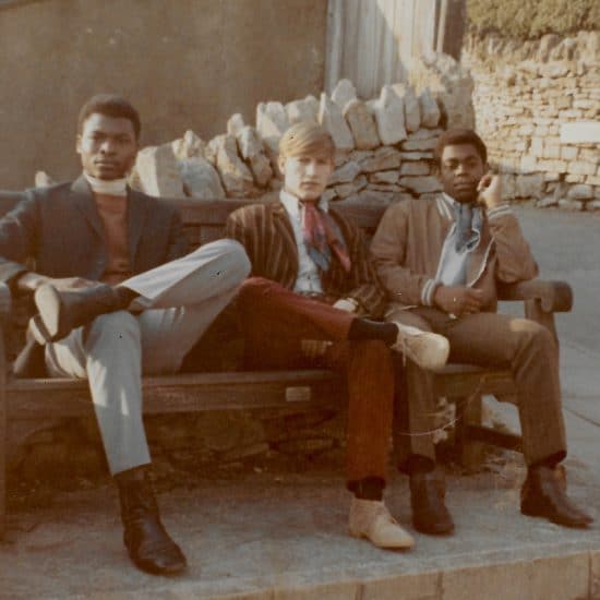 Three Young Men on a Bench by Dan Guthrie